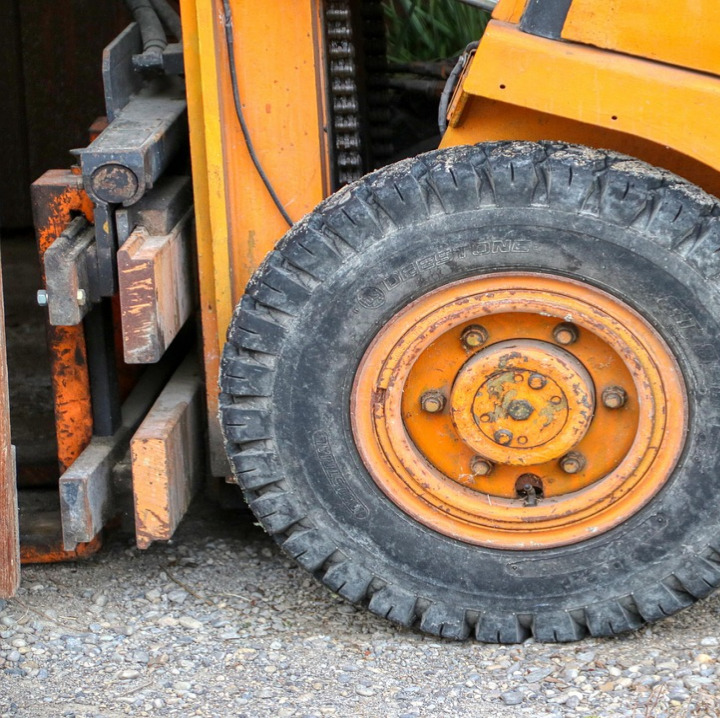 forklift moving palletized goods